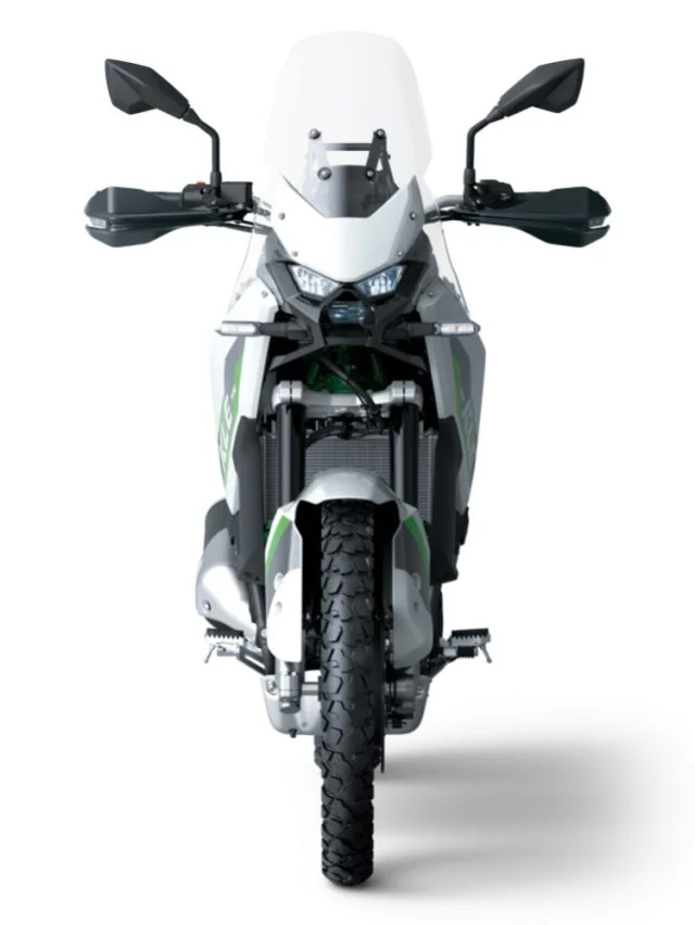 Front view of the white Kawasaki KLE500 SE showing the twin LED headlights, tall windscreen, hand guards and 21 inch front wheel