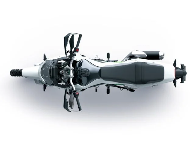 Top-down view of the white Kawasaki KLE500 SE showing the wide handlebar, narrow tank and long stepped seat