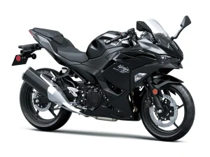 2026 Kawasaki Ninja 500 in Metallic Spark Black, front three-quarter view showing the full fairing and 17 inch wheels