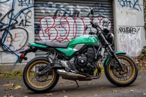 Kawasaki Z650RS left side view showing the steel trellis frame, horizontal rear shock and under-engine silencer