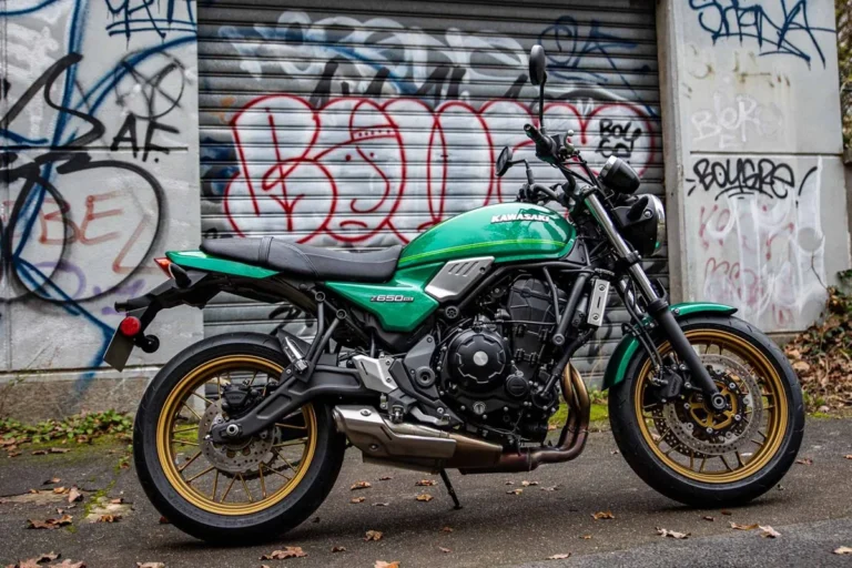 Kawasaki Z650RS left side view showing the steel trellis frame, horizontal rear shock and under-engine silencer