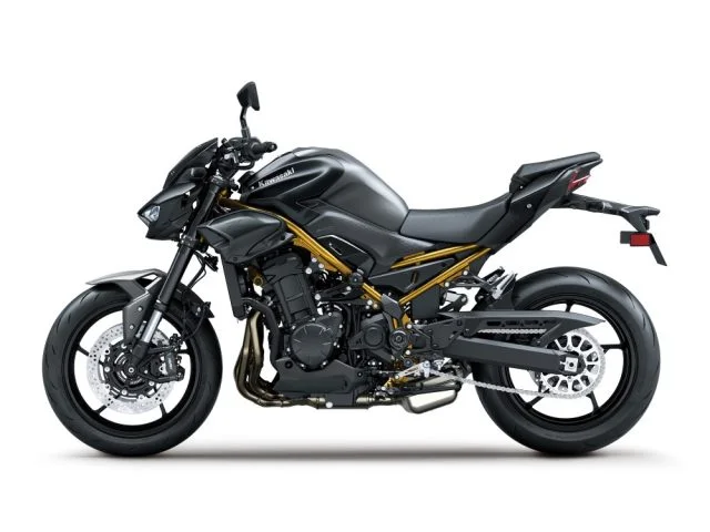 Left side studio view of the 2026 Kawasaki Z900 in Ebony with a gold-finished trellis frame